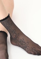 Fijne sokjes met een elegant lurex bloemenmotief van Oroblu