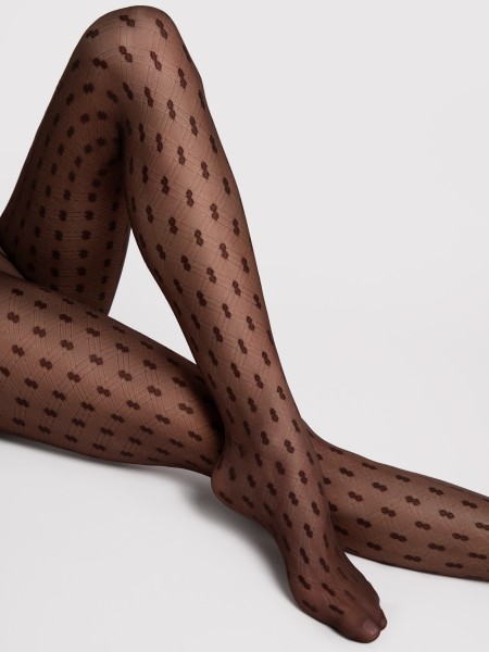 Transparante panty met stippenpatroon en netlook van Fiore